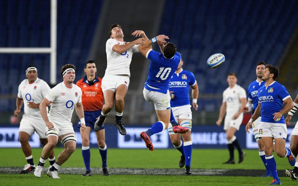 George Furbank competes for the ball with with Paolo Garbisi - GETTY IMAGES