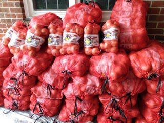 Vidalia onions are stacked and ready for pickup. The Richmond County 4-H is holding its Vidalia onion fundraiser with orders being taken at the UGA Extension office until April 29th.