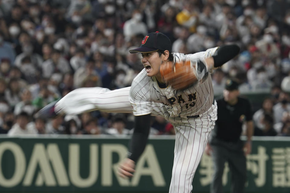 Shohei Ohtani of Japan throws during the fifth inning of the quarterfinal game between Italy and Japan at the World Baseball Classic (WBC) at Tokyo Dome in Tokyo, Japan, Thursday, March 16, 2023. (AP Photo/Toru Hanai)