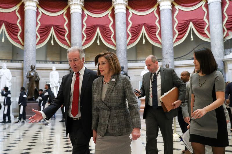 U.S. House Speaker Nancy Pelosi (D-CA) walks with House Ways and Means Committee Chairman Richard Neal (D-MA) on Capitol Hill in Washington