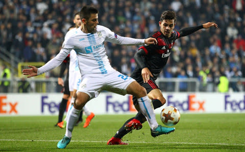 Rijeka's Domagoj Pavicic in action with AC Milan's Andre Silva - Credit: REUTERS/Antonio Bronic