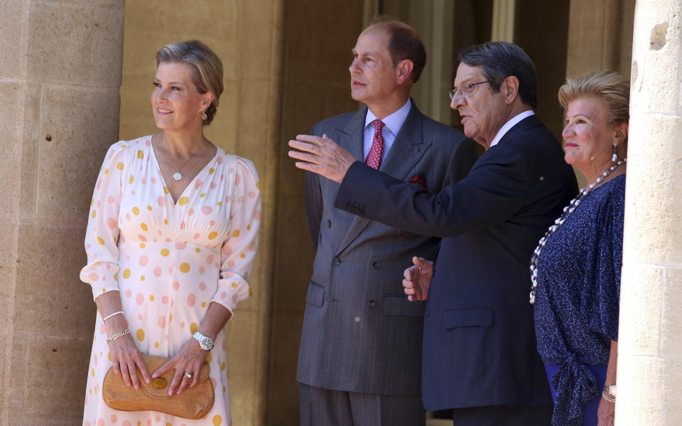 Cyprus President Nicos Anastasiades, second right, and his wife Antri, right, receive Britain's Prince Edward and Sophie, Countess of Wessex at the presidential palace in the capital Nicosia, Cyprus, Tuesday, June 21, 2022. (AP Photo/Philippos Christou)