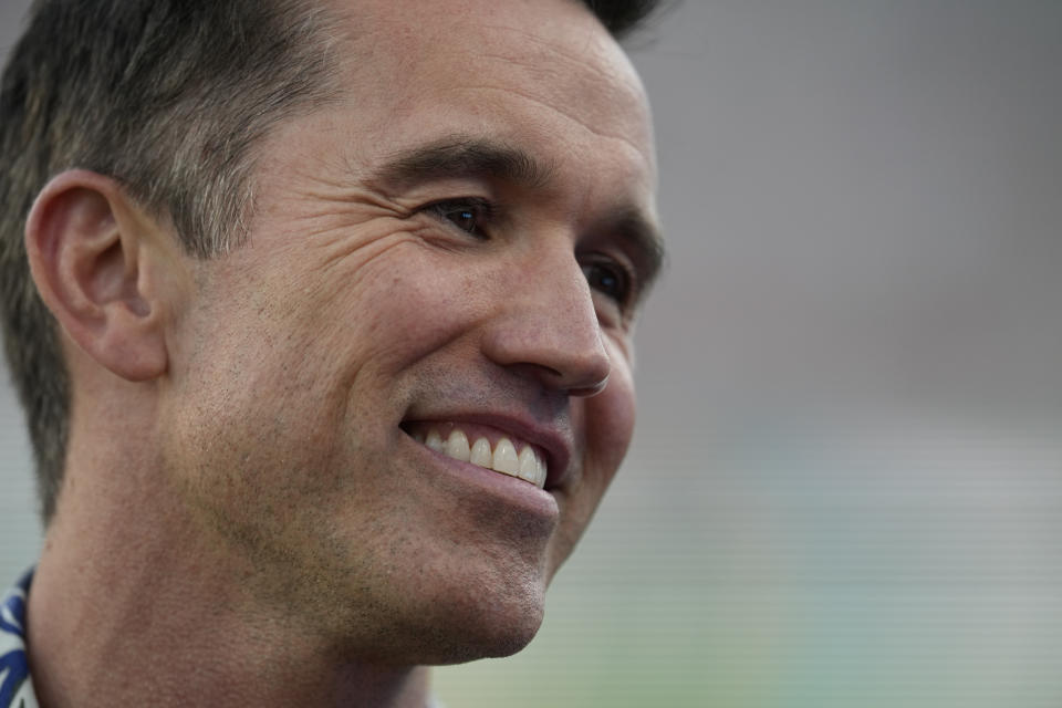 Wrexham co-owner Rob McElhenney smiles before a club friendly soccer match against Manchester United, Tuesday, July 25, 2023, in San Diego. (AP Photo/Gregory Bull)
