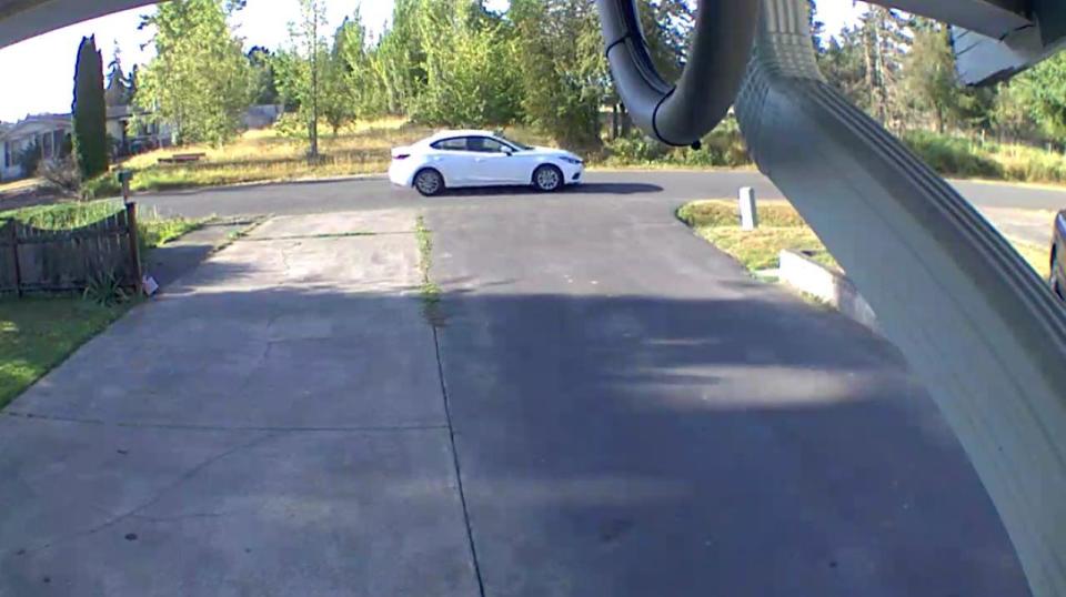 A neighbor's security camera captured Kassanndra Cantrell's white Mazda leaving her neighborhood on the morning of Aug. 25, 2020, the day she went missing.  / Credit: Pierce County Sheriff's Department