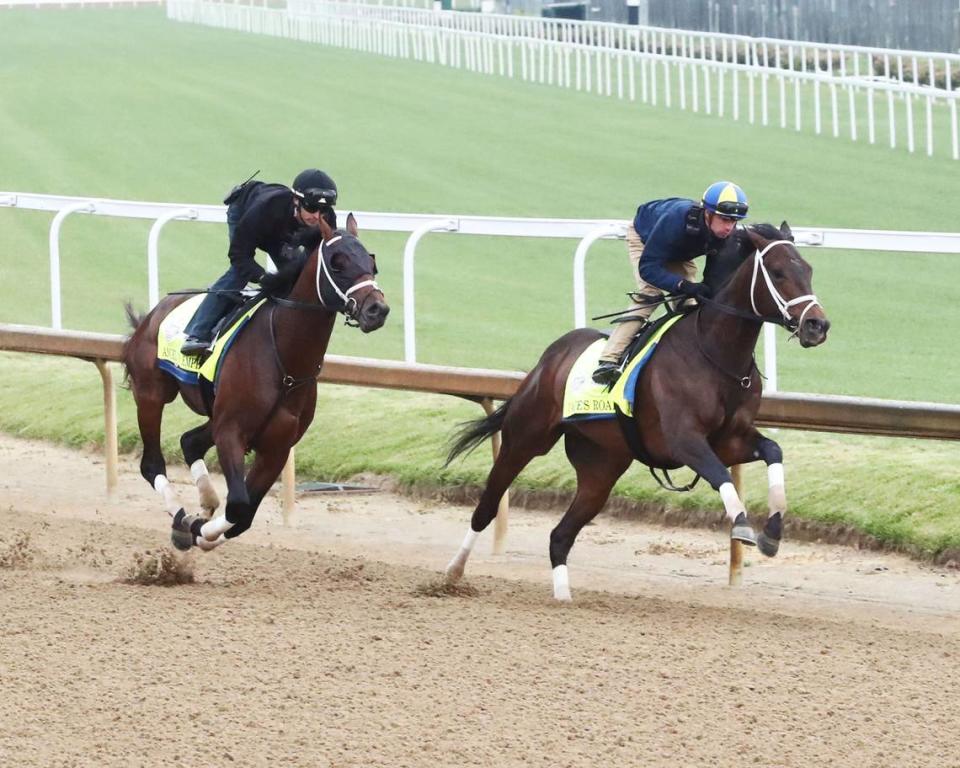 Kentucky Derby contenders Angel of Empire, left, and Jace’s Road put in a joint workout at Churchill Downs last Saturday for trainer Brad Cox.