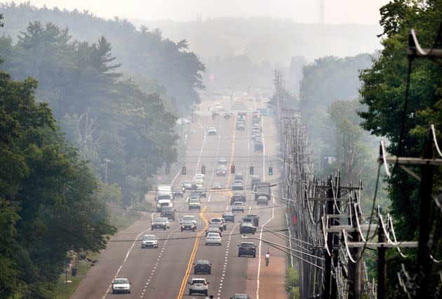 Smoke from wildfires in Nova Scotia envelopes Washington Street in Wrentham, Massachusetts, on Tuesday.