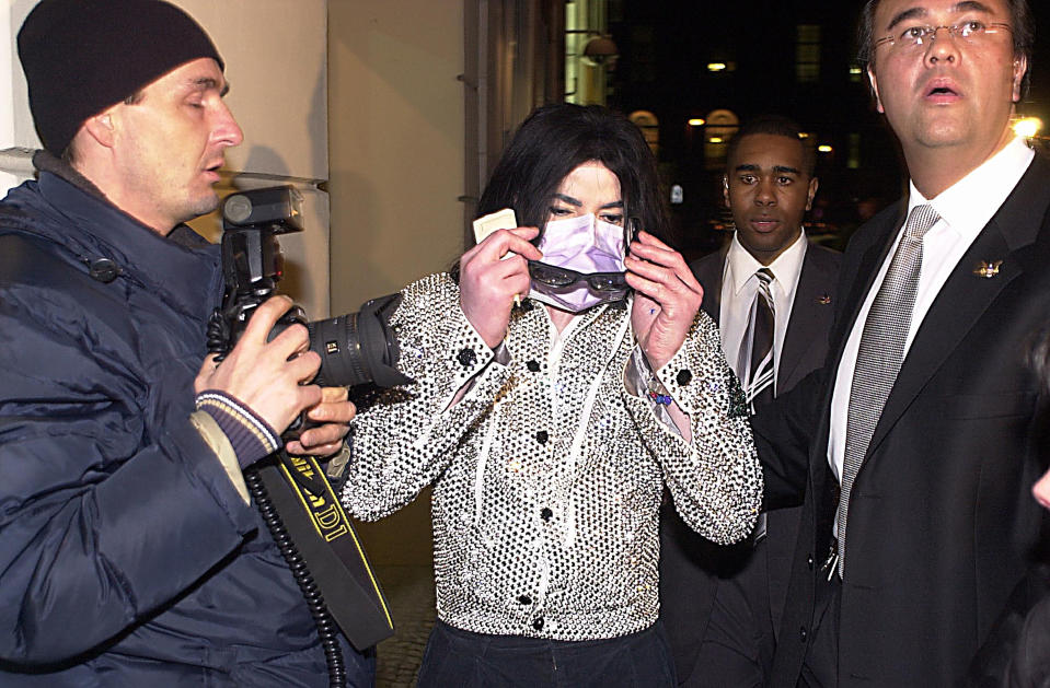 Michael Jackson, shown in 2002, wore disguises in an effort to avoid the paparazzi. (Photo: Eric Richard/Getty Images)