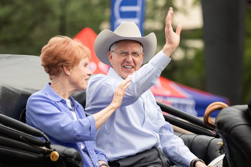Elder D. Todd Christofferson, of the Quorum of the Twelve Apostles of The Church of Jesus Christ of Latter-days Saints, with his wife Sister Kathy Christofferson wave during the annual Days of ’47 Parade in Salt Lake City on Monday, July 24, 2023. | Megan Nielsen, Deseret News