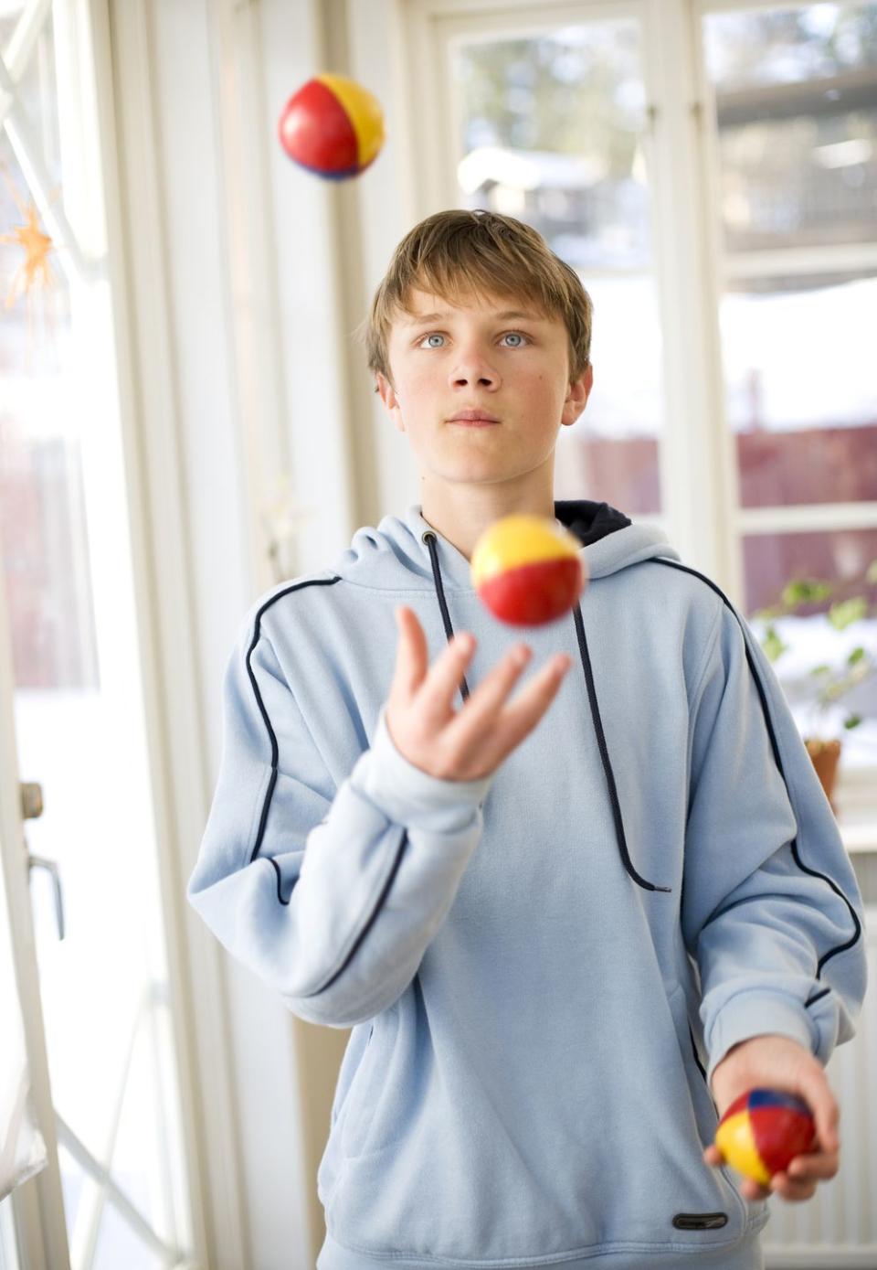 a boy juggling sweden fun activities for kids