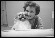 <p>White with her puppy Bandit, who reportedly served as the inspiration for her company name, Bandy Productions.</p>