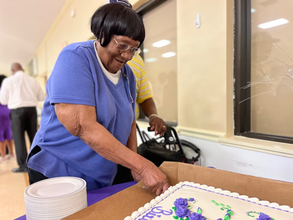 Lula Mae Keaton cuts birthday cake at a celebration of her 105th birthday held on June 25, 2022 in Candler. Keaton’s actual birthdate is June 15, 1917.