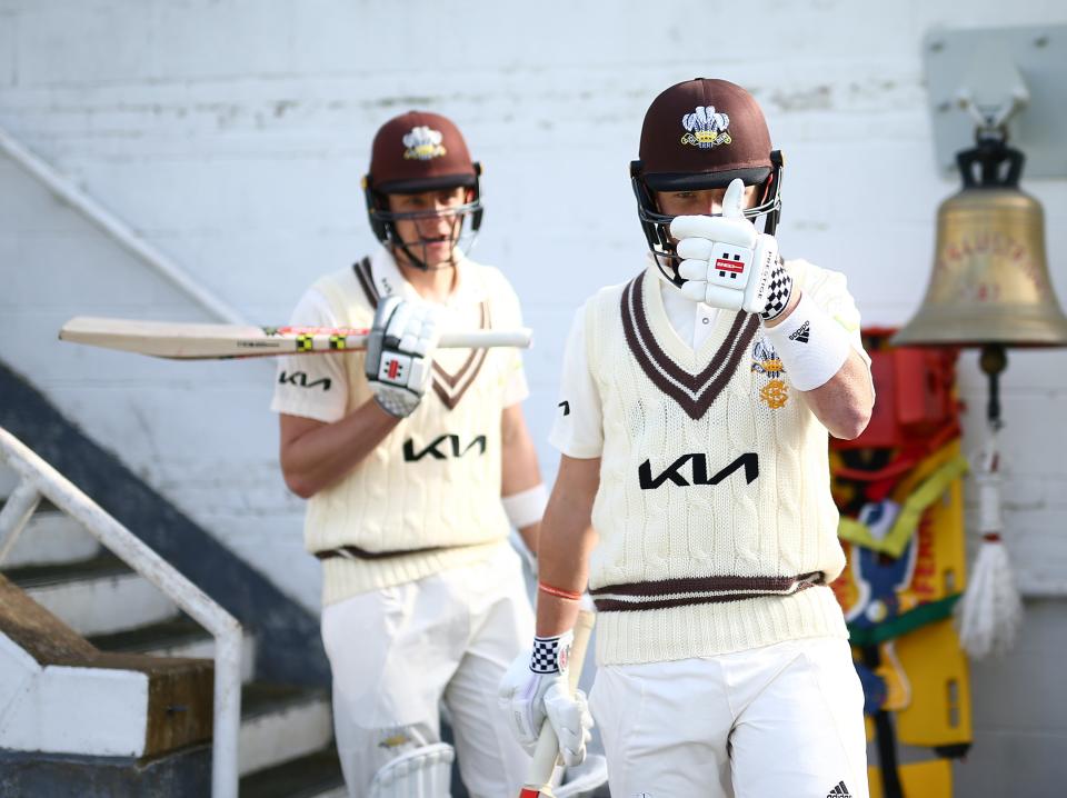 Ollie Pope and Jamie Smith of Surrey in action during a pre-season warm-up match (Getty Images for Surrey CCC)