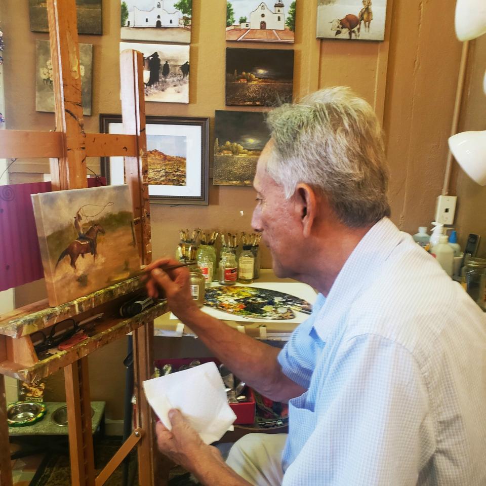 Artist Alberto Escamilla is shown at work in his gallery at 1445 Main St., Suite B1-2, San Elizario, Texas.