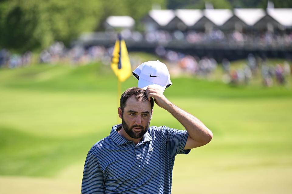 Scottie Scheffler walks off the 18th green following his final round at the 2024 PGA Championship.