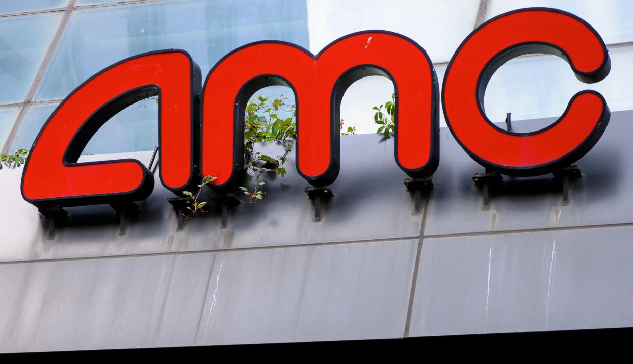 The AMC logo is seen at the AMC Georgetown 14 Theatres in Washington, DC on June 3, 2021. - A day after its share price almost doubled, AMC Entertainment on June 3 successfully completed a large new equity offering despite warning prospective shareholders that they could potentially lose their entire investment. (Photo by MANDEL NGAN / AFP) (Photo by MANDEL NGAN/AFP via Getty Images)