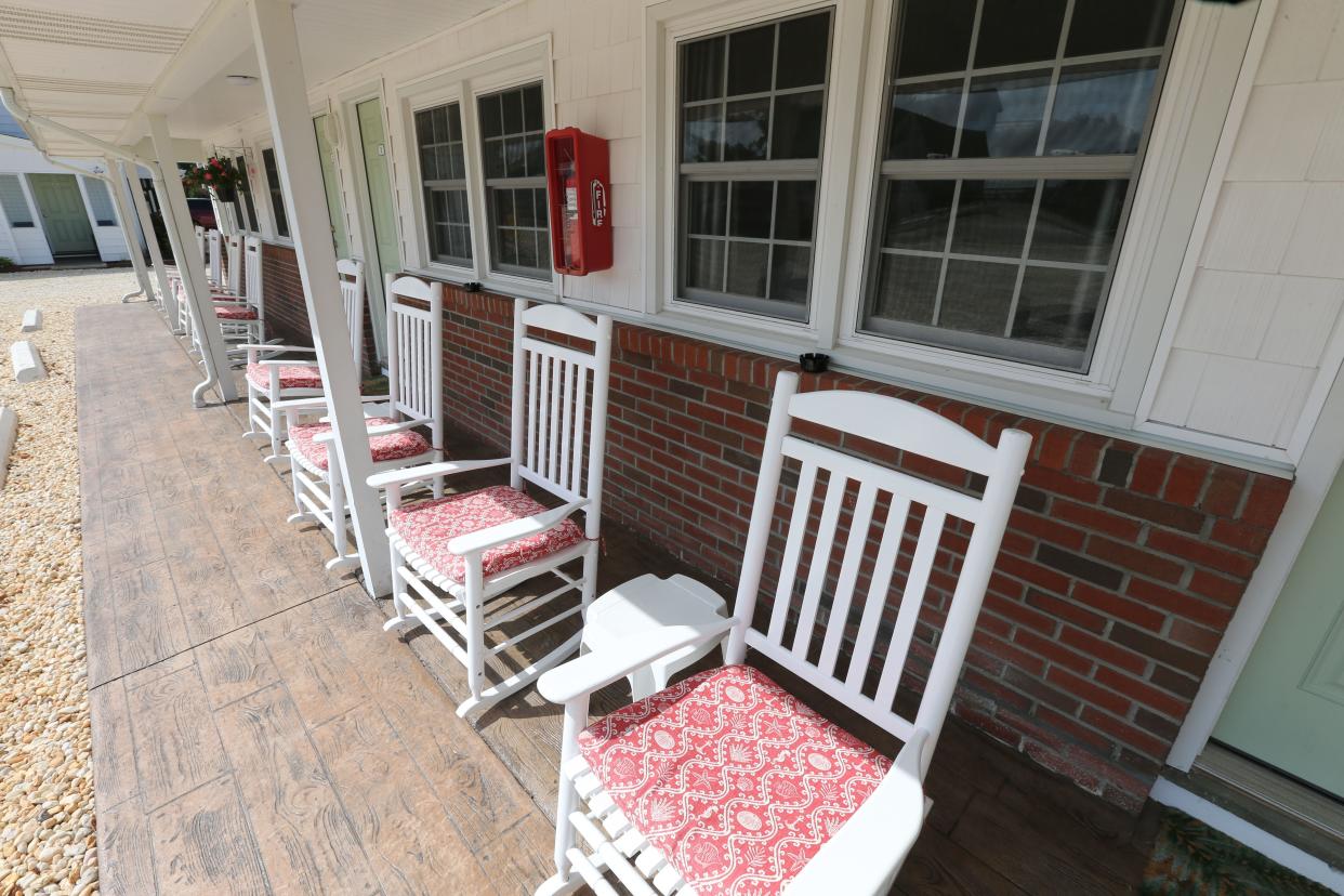 Rocking chairs sit outside rooms at The Broadway Court Motel in Point Pleasant Beach Thursday, September 5, 2024. The 1950s-era motel was taken over by owners Lisa Sassman and her husband Mike two years ago and fully renovated with charming upgrades.