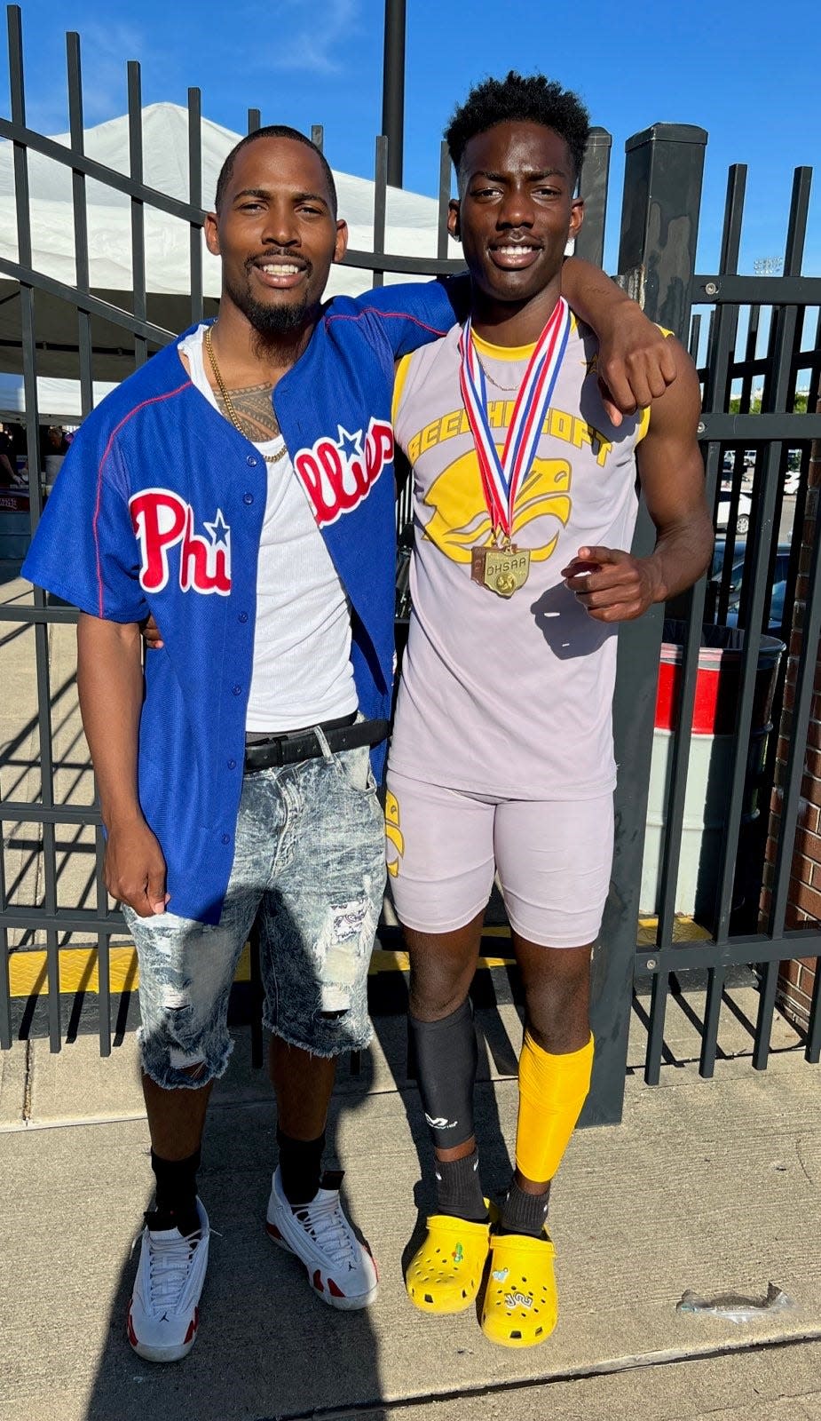 Jayden Douglas with his brother Frank Douglas, a former Madison star hurdler.