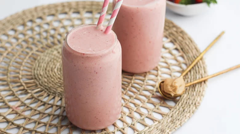 Two glasses of pink smoothies