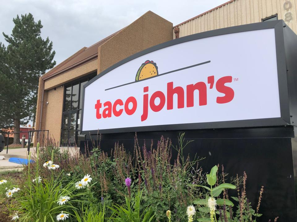 In this Aug. 1, 2019 photo the corporate headquarters of Cheyenne-based Taco John's, which has nearly 400 locations in 23 states, is seen in Cheyenne, Wyo. Taco John's recently sent Freedom's Edge Brewing Co. in Cheyenne a cease-and-desist letter for using "Taco Tuesday" to advertise the taco truck parked outside on Tuesdays. Taco John's has owned the trademark to "Taco Tuesday" since 1989 and calls the term part of its "DNA." Some say the term has become so common that Taco John's can't legitimately continue to claim it. (AP Photo/Mead Gruver)