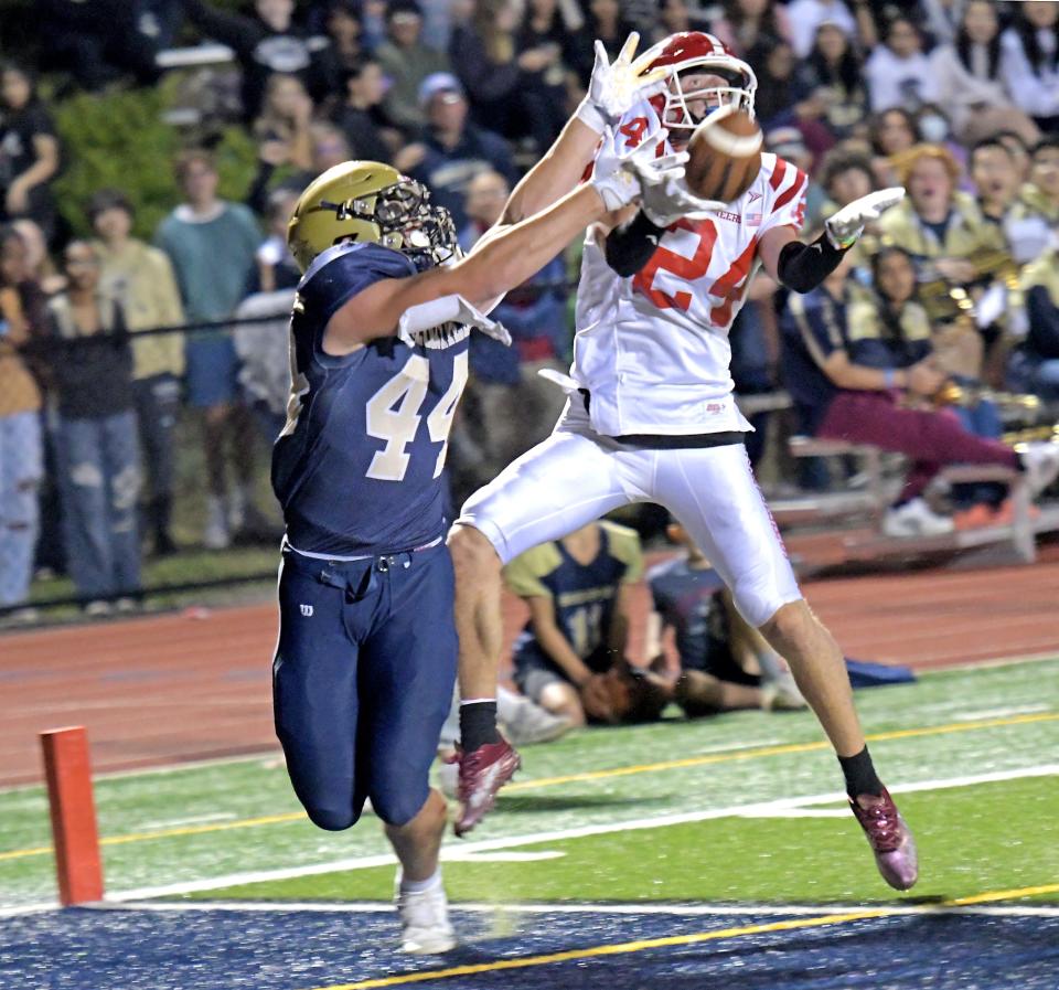 Shrewsbury's Cooper Ackerman, left, breaks up a pass in the end zone intended for St. John's Luke Lengel at the end of the first half in last year's meeting.