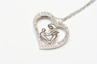 <div class="caption-credit"> Photo by: iStock Photo</div><div class="caption-title">Motherhood Jewelry</div>Maybe you didn't get her a push present when the kids were born, but it's never too late to commemorate your children in the form of jewelry. Whether it's a necklace with their initials or earrings with their birthstones, telling her you remember what she brought into your world is always appropriate, and, you know, awesome. <br> <i><a rel="nofollow noopener" href="http://blogs.babble.com/strollerderby/2012/11/07/the-10-most-clever-holiday-gifts-ever-for-moms/?cmp=ELP|bbl|lp|YahooShine|Main||100112|||famE|||" target="_blank" data-ylk="slk:Visit Red Envelope for lovely motherhood jewelry;elm:context_link;itc:0;sec:content-canvas" class="link ">Visit Red Envelope for lovely motherhood jewelry</a> <br> <a rel="nofollow noopener" href="http://blogs.babble.com/kid-scoop/2012/02/07/the-10-worst-parenting-jabs-moms-say-to-dads/?cmp=ELP|bbl|lp|YahooShine|Main||100112|||famE|||" target="_blank" data-ylk="slk:Related: 10 things you should never say to your husband...but probably do;elm:context_link;itc:0;sec:content-canvas" class="link "><b>Related: 10 things you should never say to your husband...but probably do</b></a></i>