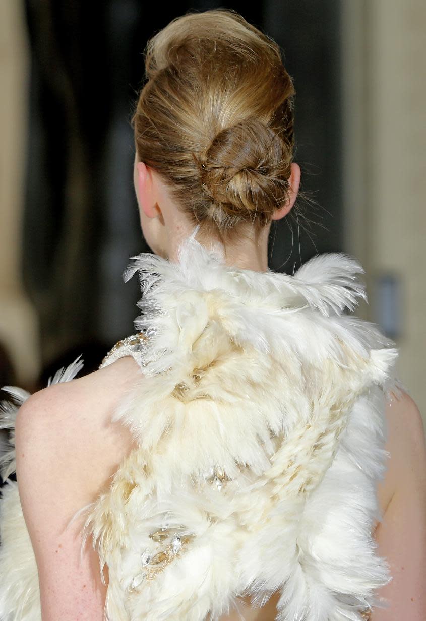 A model wears a creation by fashion designer Bouchra Jarrar during her Women's Fall Winter 2013-2014 haute couture fashion collection presented at Antoine Bourdelle Museum in Paris Tuesday, July 2, 2013 in Paris. (AP Photo/Jacques Brinon)