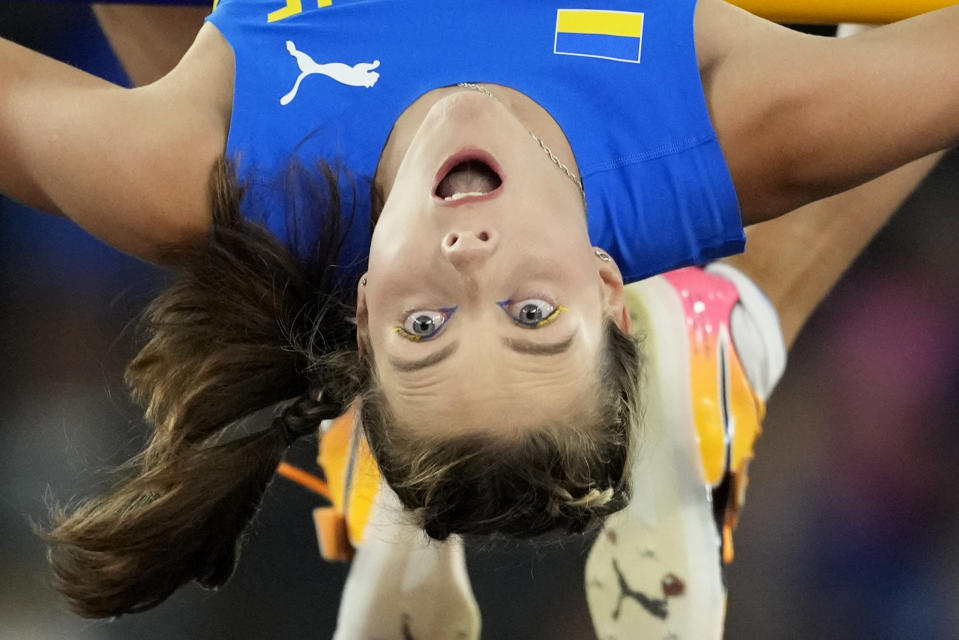 Yaroslava Mahuchikh, of Ukraine, makes an attempt in the women's high jump qualification at the the European Athletics Championships in Rome, Friday, June 7, 2024. (AP Photo/Andrew Medichini)