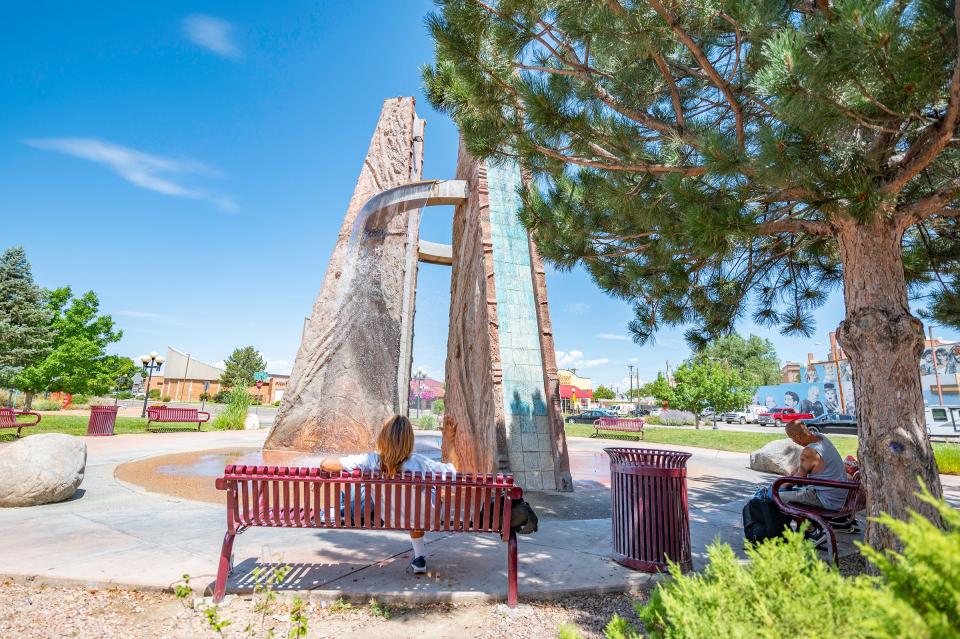 The fountain at City Center Plaza is a popular spot for unhoused individuals to cool off in high, and often dangerous temperatures.