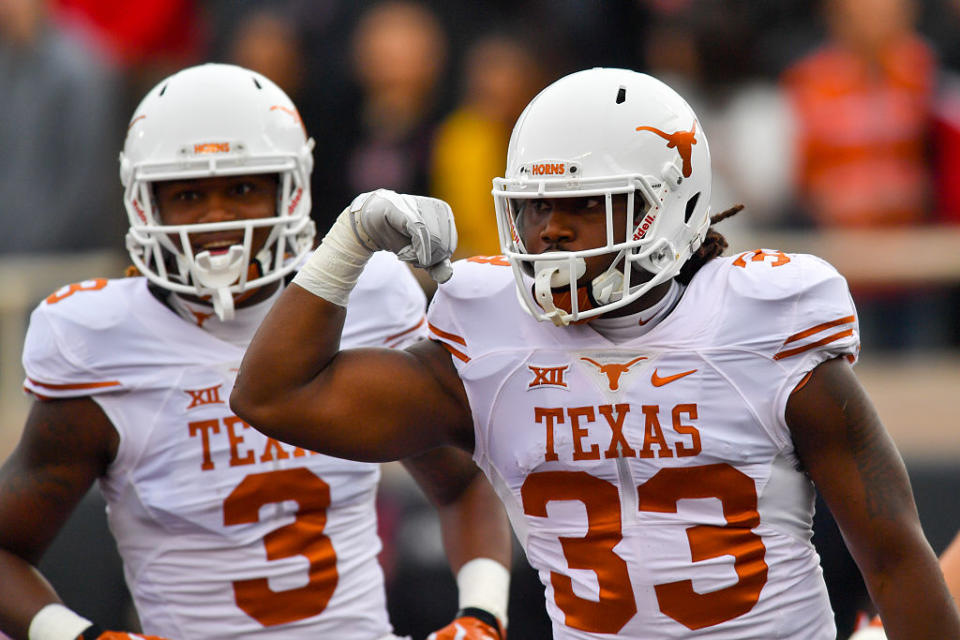 Father of Texas juniors D'Onta and Armonti Foreman went on a Twitter rant after Texas struggled against Kansas. (Getty)