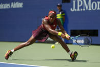 Coco Gauff, of the United States, returns a shot to Jelena Ostapenko, of Latvia, during the quarterfinals of the U.S. Open tennis championships, Tuesday, Sept. 5, 2023, in New York. (AP Photo/Manu Fernandez)