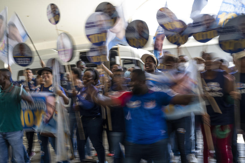 Supporters of Bahia state representative Marcio Marinho, who is running for re-election, get revved up during a political rally organized by evangelical candidates, in Salvador, Brazil, Saturday, Sept. 17, 2022. Marinho is an an ordained bishop of the Universal Church of the Kingdom of God, one of Brazil’s largest evangelical congregations. (AP Photo/Rodrigo Abd)