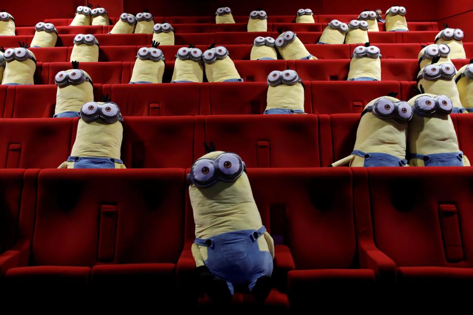 Minions toys are seen on cinema chairs to maintain social distancing between spectators at a MK2 cinema in Paris as Paris' cinemas reopen doors to the public following the coronavirus disease (COVID-19) outbreak in France, June 22, 2020. REUTERS/Benoit Tessier