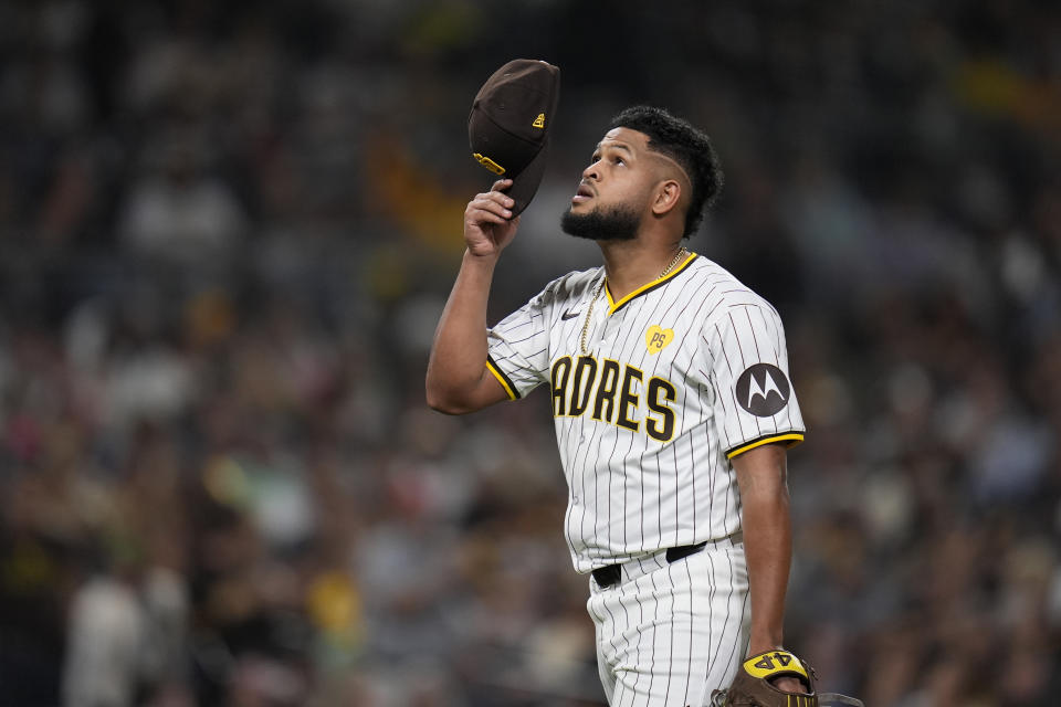 San Diego Padres starting pitcher Randy Vasquez reacts as he exits during the seventh inning of a baseball game against the Arizona Diamondbacks, Thursday, June 6, 2024, in San Diego. (AP Photo/Gregory Bull)