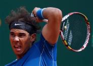 Rafael Nadal of Spain returns the ball to Teymuraz Gabashvili of Russia during the Monte Carlo Masters in Monaco April 16, 2014. REUTERS/Eric Gaillard