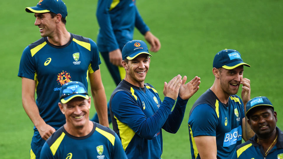 Tim Paine and teammates at the Gabba. (Photo by ISHARA S. KODIKARA/AFP/Getty Images)