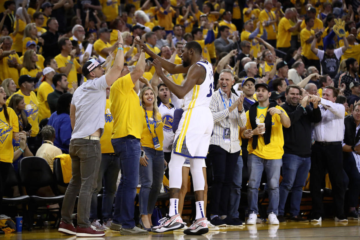 One lucky Golden State Warriors shelled out a shocking amount for courtside seats to Game 4 of the NBA Finals.  (Photo by Ezra Shaw/Getty Images)