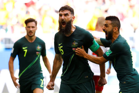 Soccer Football - World Cup - Group C - Denmark vs Australia - Samara Arena, Samara, Russia - June 21, 2018 Australia's Mile Jedinak celebrates scoring their first goal with team mates REUTERS/Michael Dalder