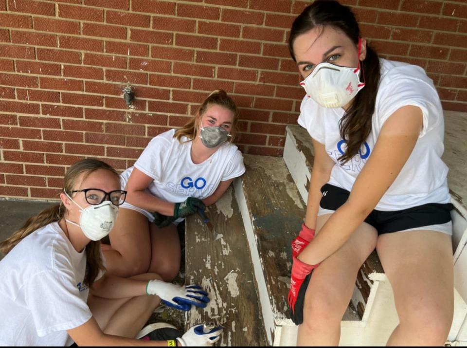 Out of state students with Group Mission Trips spent a week in Davidson County providing home repair, including scraping and repainting the exterior of homes.