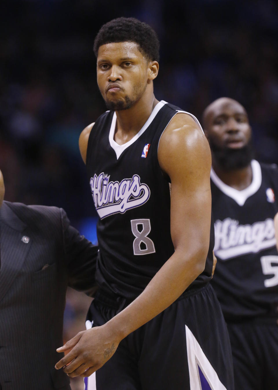 Sacramento Kings forward Rudy Gay (8) leaves the court after being ejected from the game in the fourth quarter of an NBA basketball game against the Oklahoma City Thunder in Oklahoma City, Sunday, Jan. 19, 2014. Oklahoma City won 108-93. (AP Photo/Sue Ogrocki)