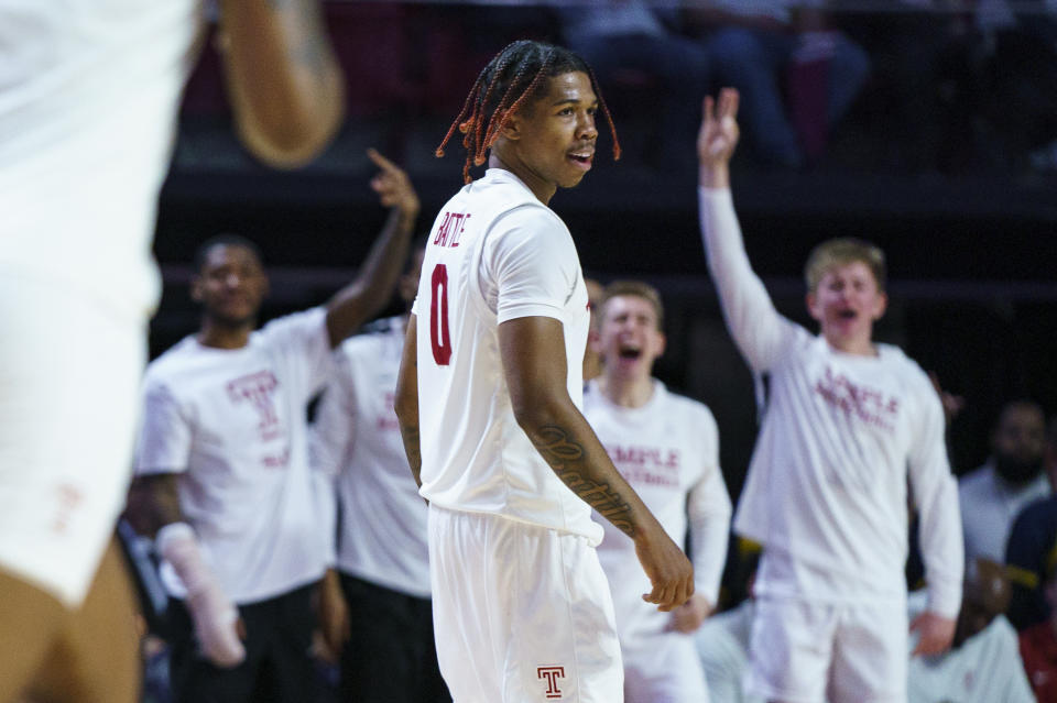 Temple's Khalif Battle reacts after his 3-point basket during the first half of an NCAA college basketball game against Houston, Sunday, Feb. 5, 2023, in Philadelphia. (AP Photo/Chris Szagola)
