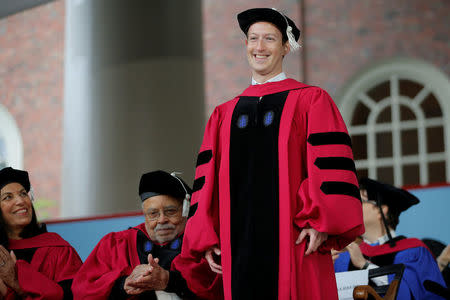 Facebook founder Mark Zuckerberg stands to receive an honorary Doctor of Laws degree during the 366th Commencement Exercises at Harvard University in Cambridge, Massachusetts, U.S., May 25, 2017. REUTERS/Brian Snyder