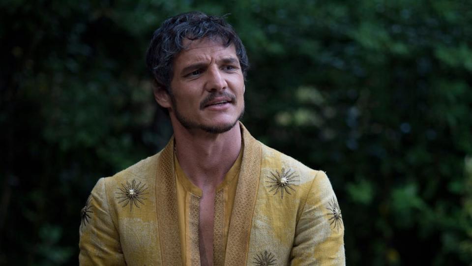 Pedro Pascal as Oberyn Martell in a yellow tunic on Game of Thrones