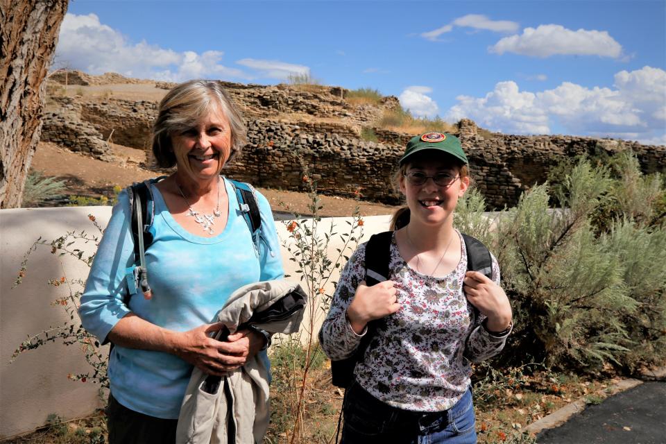 Archaeolgist Virginia Atkins, pictured here with fellow team member Moriah Sonnenberg at Aztec Ruins National Monument, describes the site "not as a dead ruin stuck in time, but with a continuing spectrum of stories to be shared of timeless farmers, children, neighbors, and visitors.”