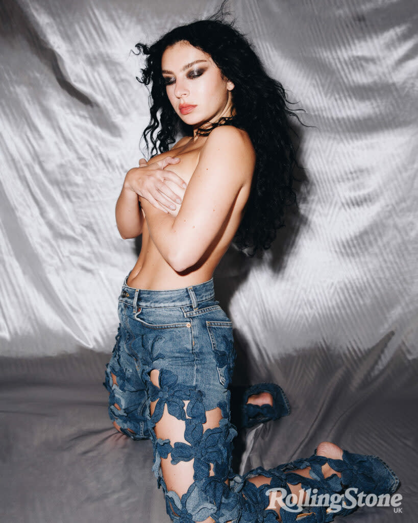 Charli wears jeans by Maison Valentino (Picture: Tyrell Hampton)