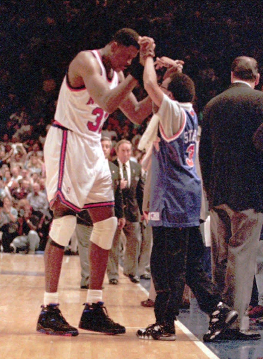 June 5, 1994; New York, NY, USA; FILE PHOTO; Knicks Patrick Ewing celebrates win over the pacers with Spike Lee as the game winds down. Mandatory Credit: Robert Deutsch-USA TODAY NETWORK