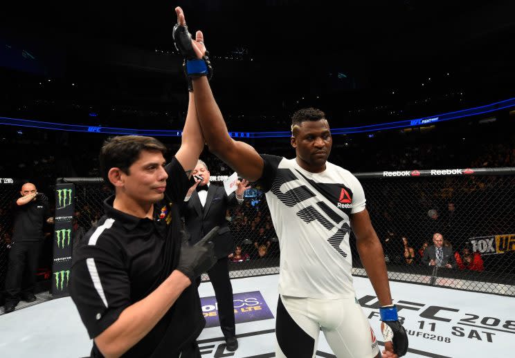  Francis Ngannou celebrates his knockout victory over Andrei Arlovski in their heavyweight fight Saturday. (Getty)