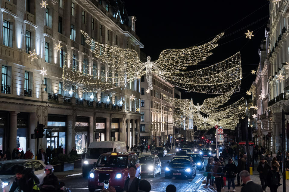 London Oxford Street lights at Christmas, with busy road. (Getty Images)