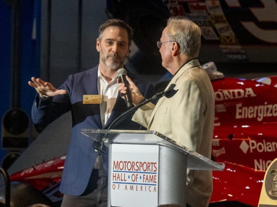 Jimmie Johnson with Monday night's reception emcee, Marty Reid.