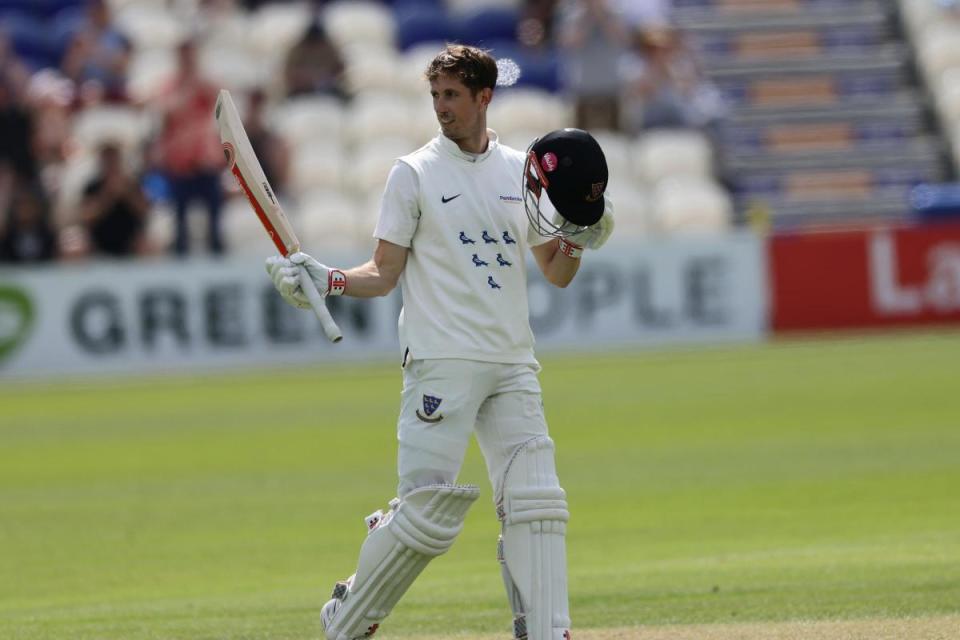 John Simpson celebrates his century at Hove <i>(Image: John Mallett)</i>