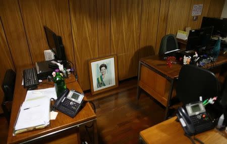 An official photograph of former president Dilma Rousseff is seen in an office inside the Presidential Palace after the final session of voting on Rousseff's impeachment trial in Brasilia, Brazil, August 31, 2016. REUTERS/Adriano Machado